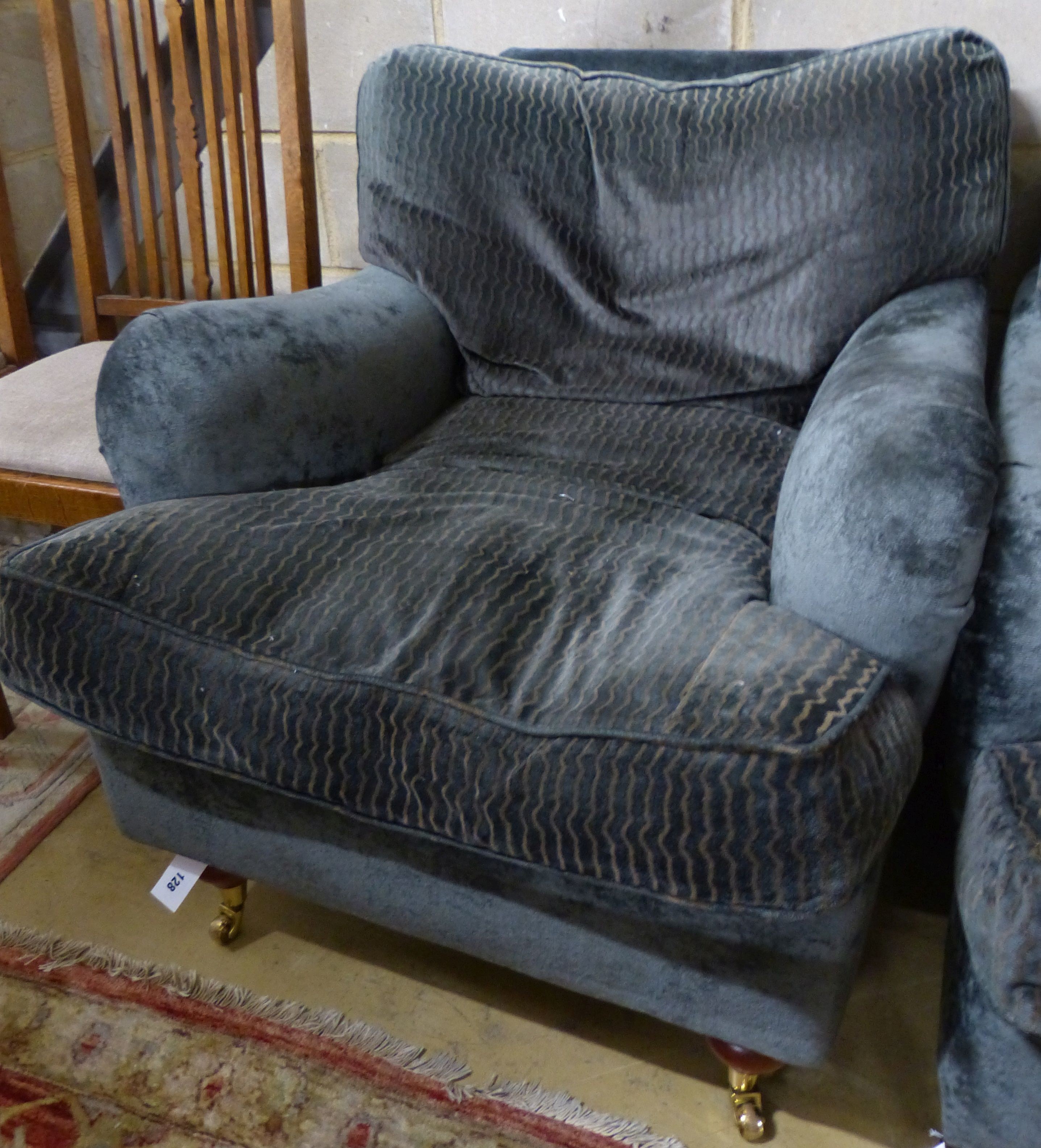 A George Smith armchair, re-upholstered
